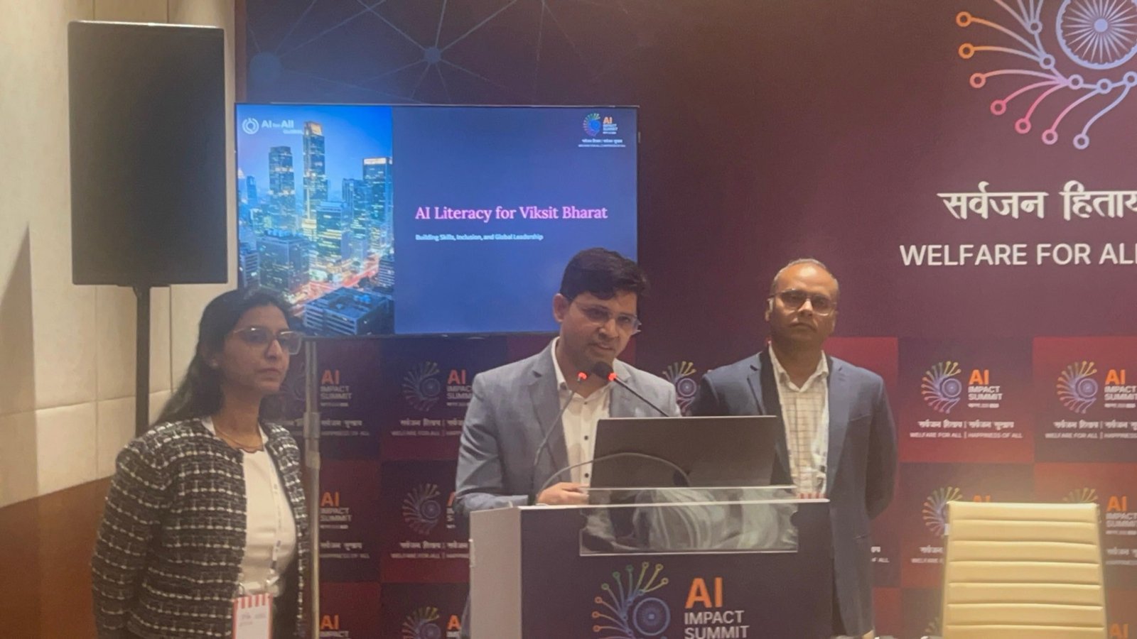 Speaker presenting AI Literacy for Viksit Bharat at India AI Impact Summit
